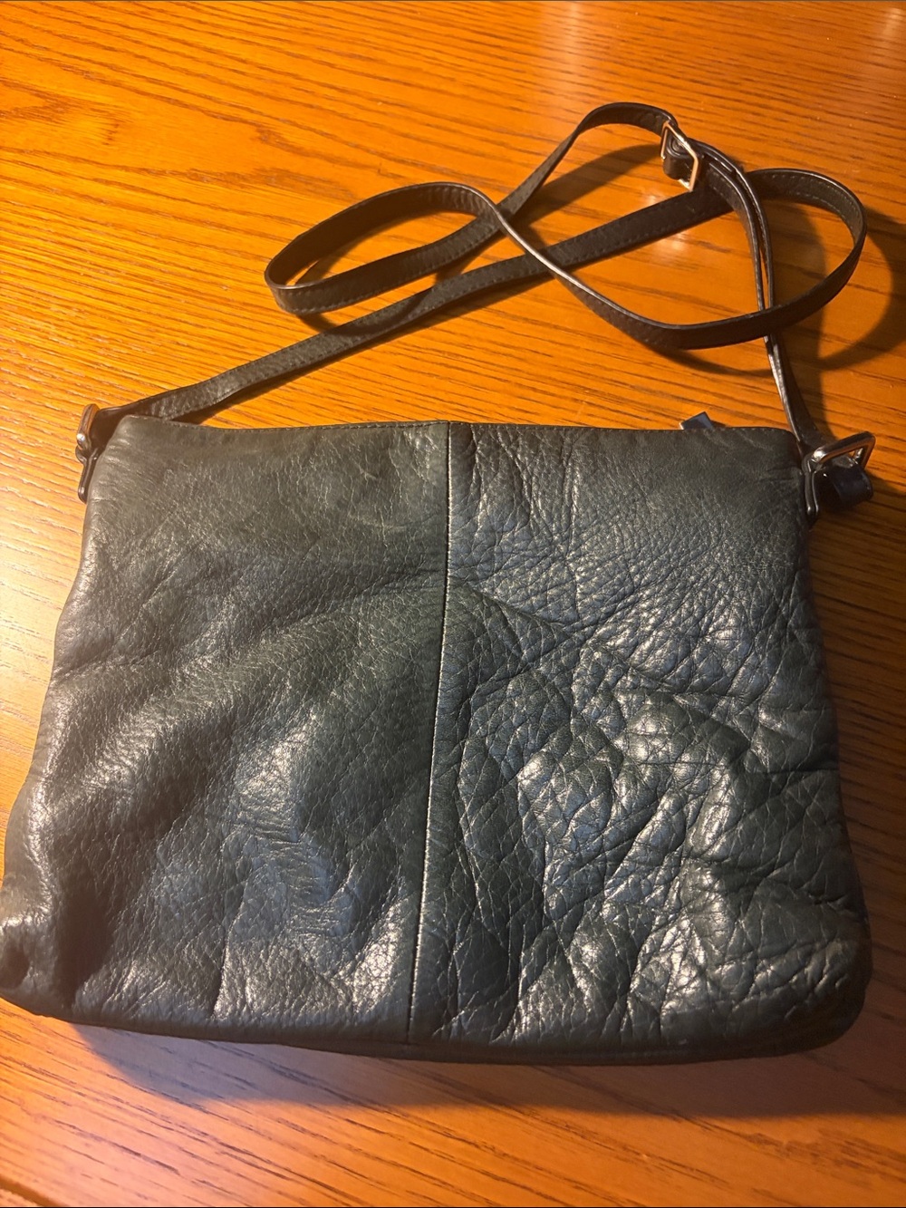 margot Leather Crossbody Bag in black.